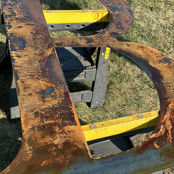 Rusted Metal Barn Letter Close-Up