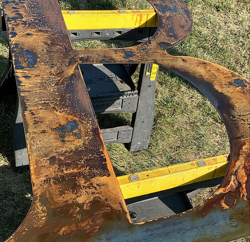 Rusted Metal Barn Letter Close-Up